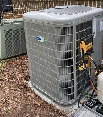 A Carrier air conditioner outside.