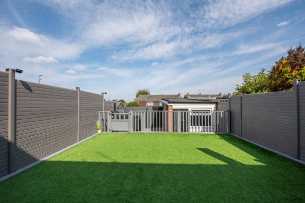 Small back garden | Grey composite fence | Fence company in Minneapolis, MN