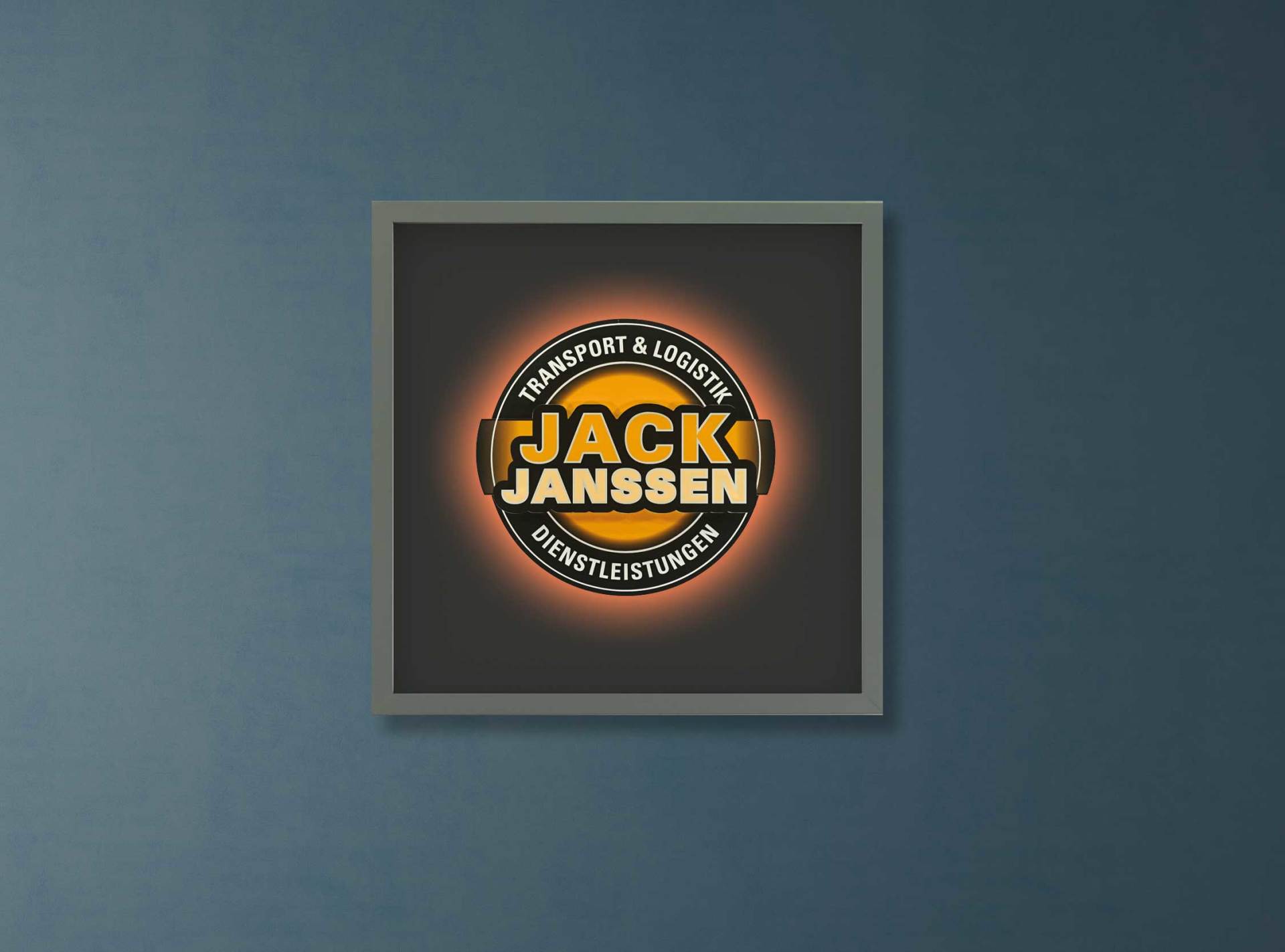 Ein Bild von Jack Janssen hängt an einer Wand