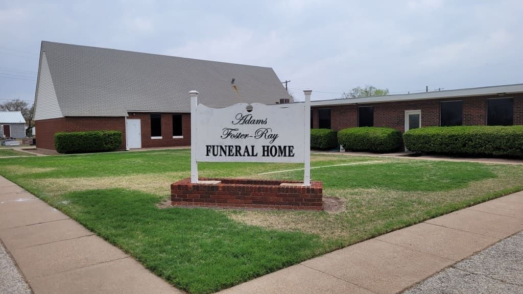 Adams-Foster-Ray Funeral Home- Outside View With Sign