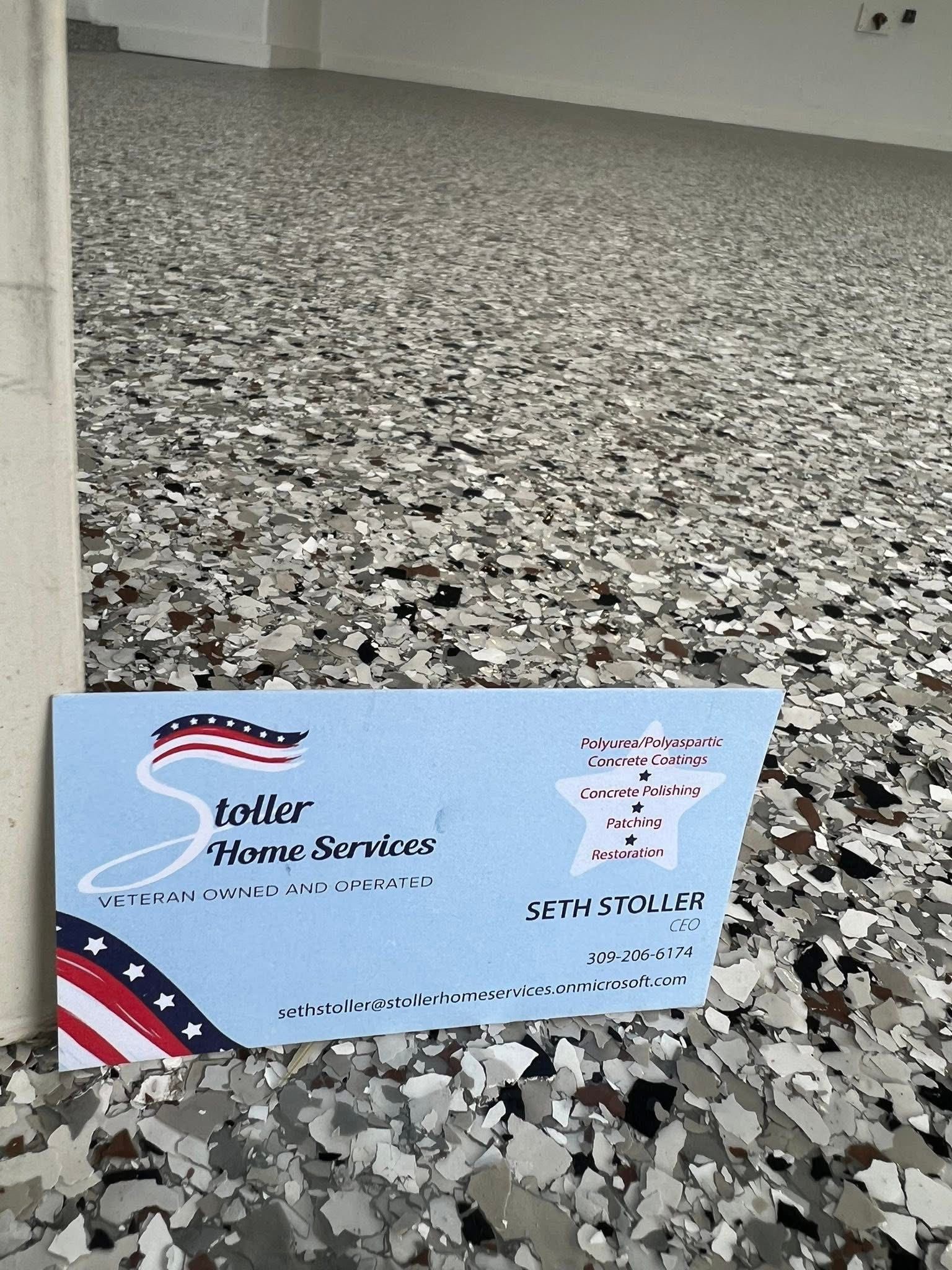 Sign for Sadler Home Services on a speckled floor.