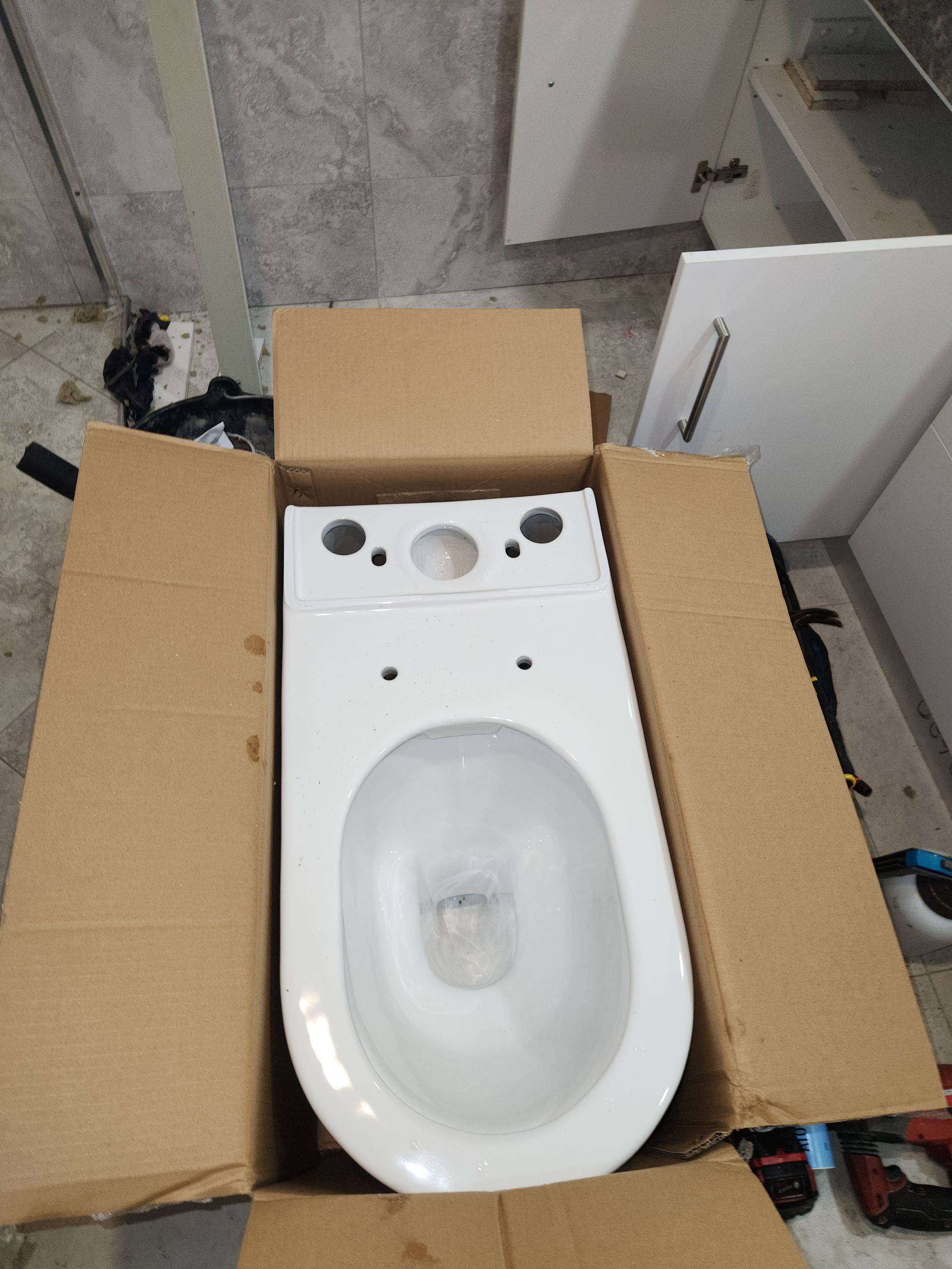 A Double Bathroom Vanity Under Construction With Sinks Installed — Kingdom Plumbing Services in Gordonvale, QLD