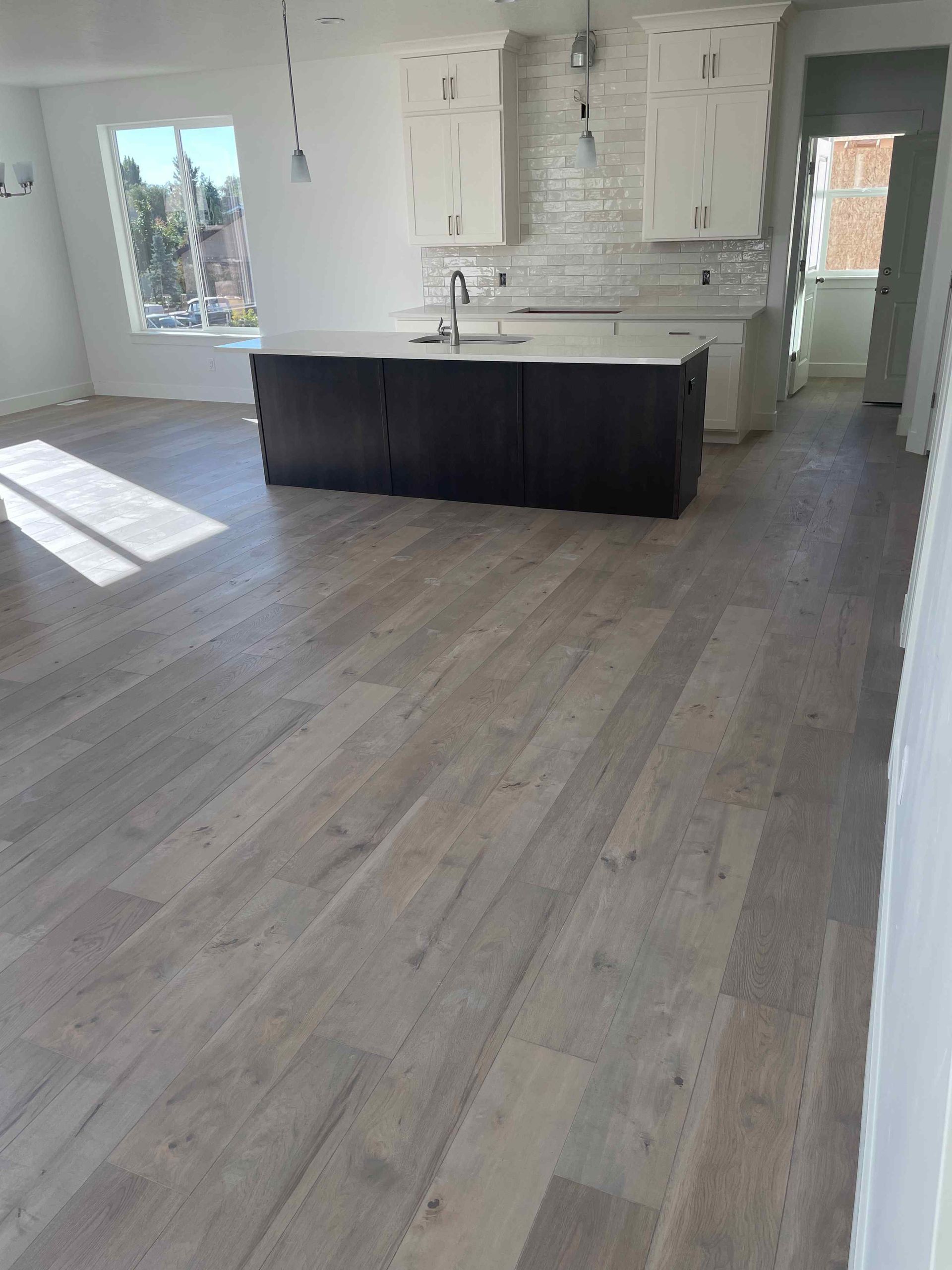 Luxury vinyl plank (LVP) and luxury vinyl tile (LVT) flooring installation in West Jordan, UT – Waterproof, durable, and stylish flooring solutions by Angel Flooring Solutions