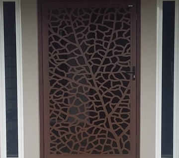 Brown Custom Security Door For Home — Aluminium Services in Portsmith, QLD