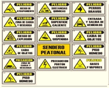 Un montón de señales de advertencia españolas sobre un fondo blanco.