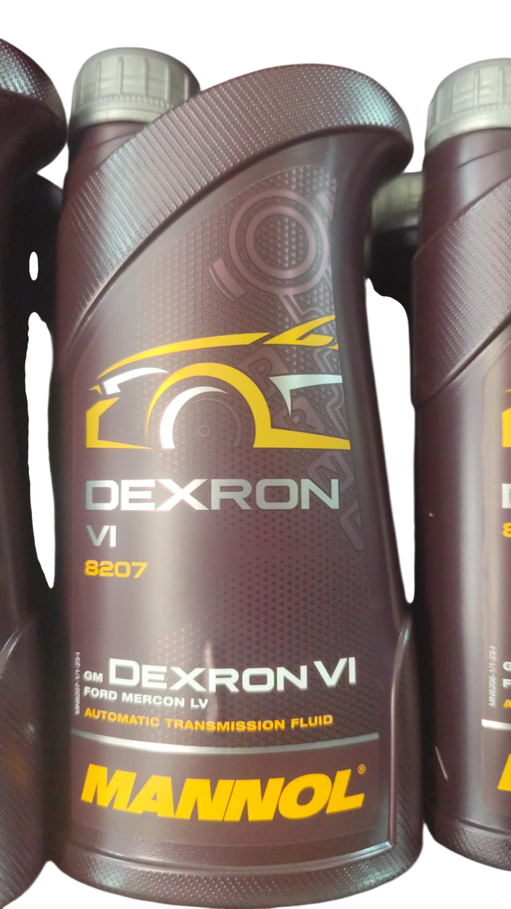 Varias botellas marrones de líquido de transmisión automática MANNOL Dexron VI.