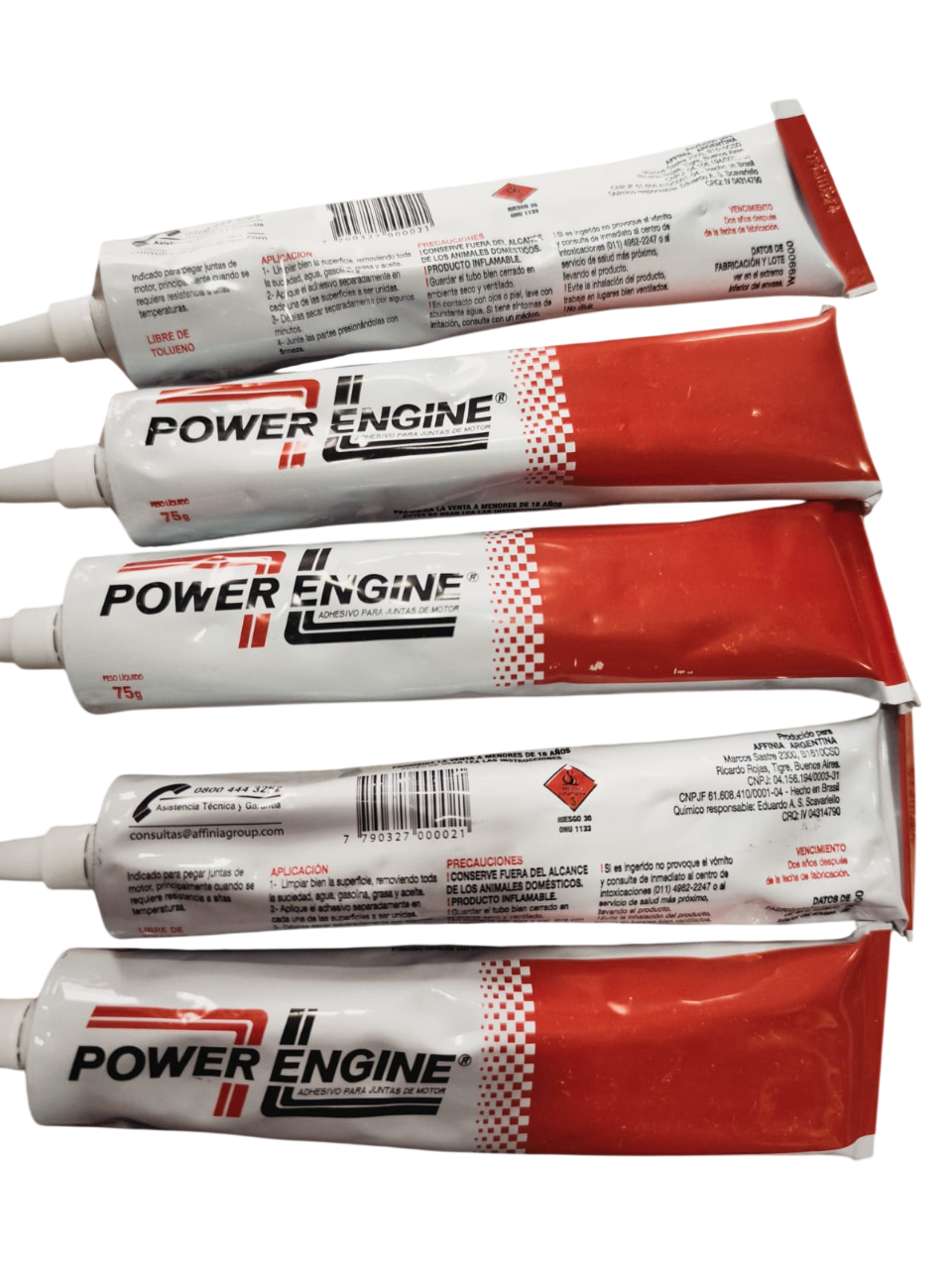 Cinco tubos de sellador Power Engine rojo y blanco.