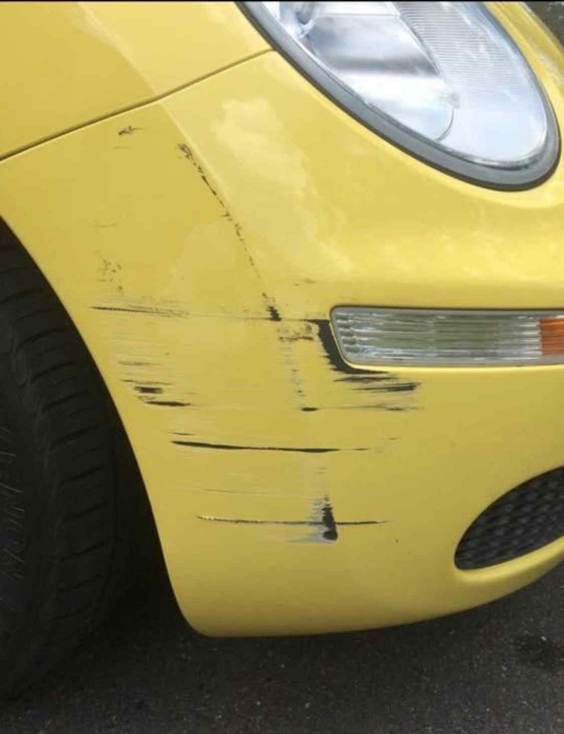 A Yellow Car Has A Scratch On The Front Bumper  — Rapid Auto Refinish in Toowoomba, QLD 