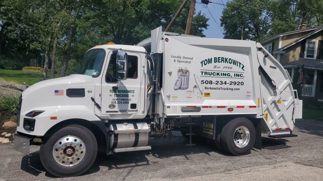 White garbage truck with 