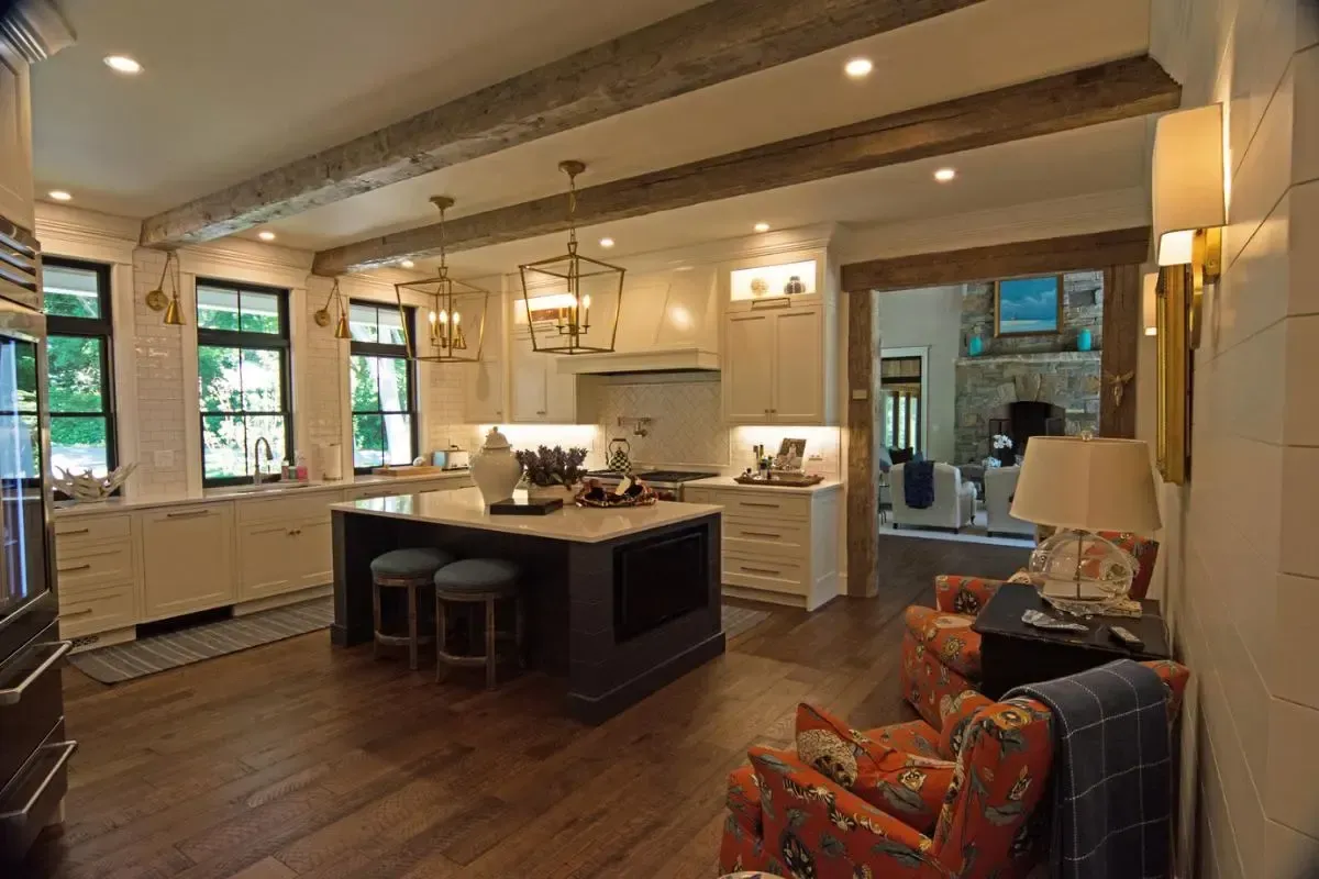A large kitchen with a large island in the middle of the room.