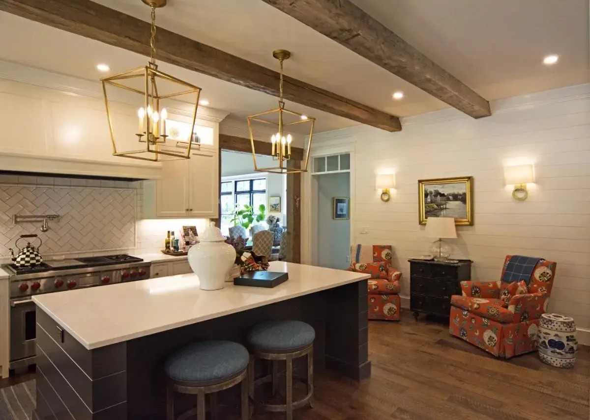 There is a large island in the middle of the kitchen.