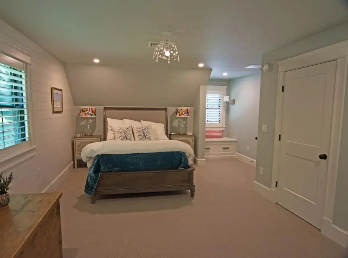 There is a large bed in the middle of the room.