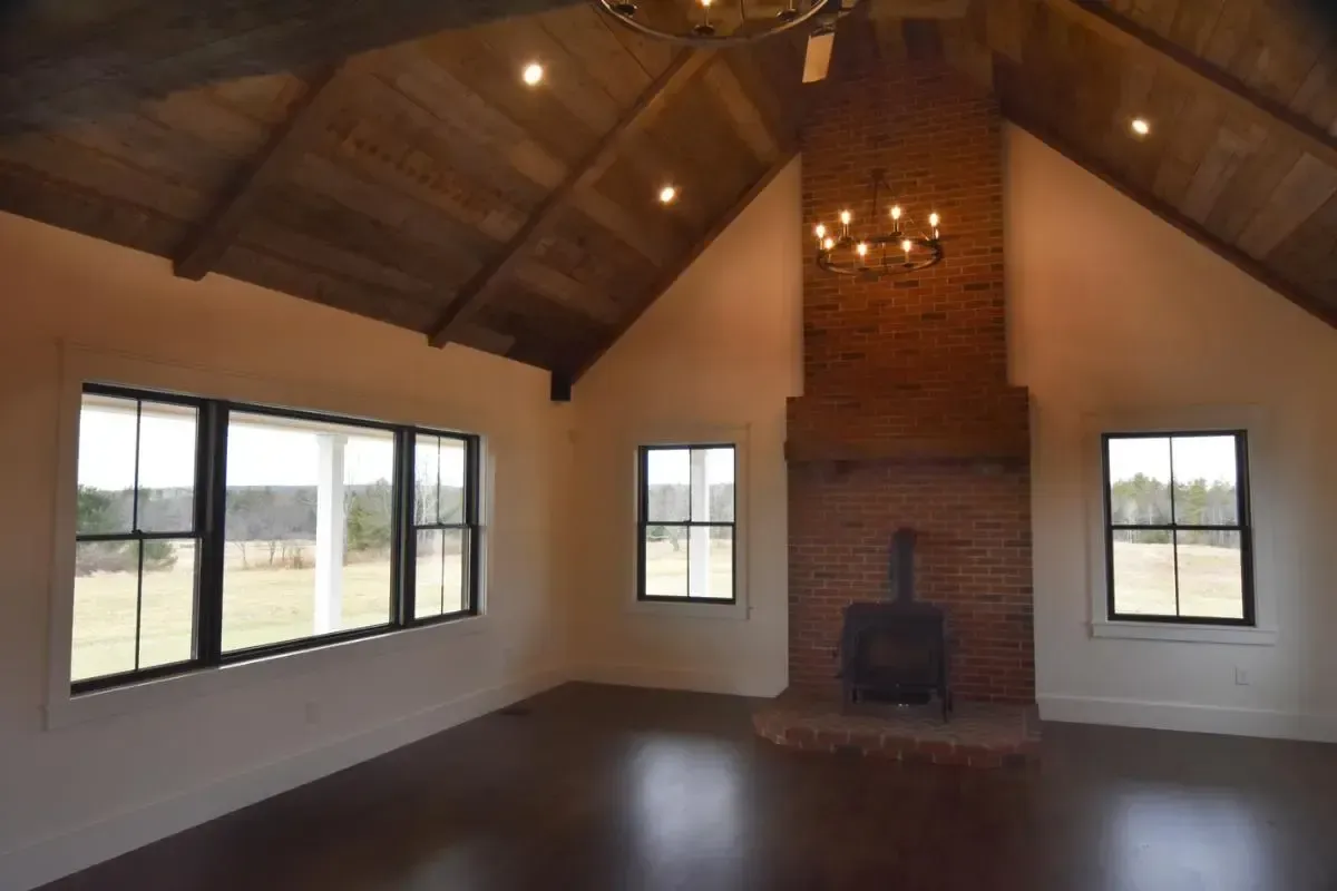 There is a fireplace in the middle of the room.