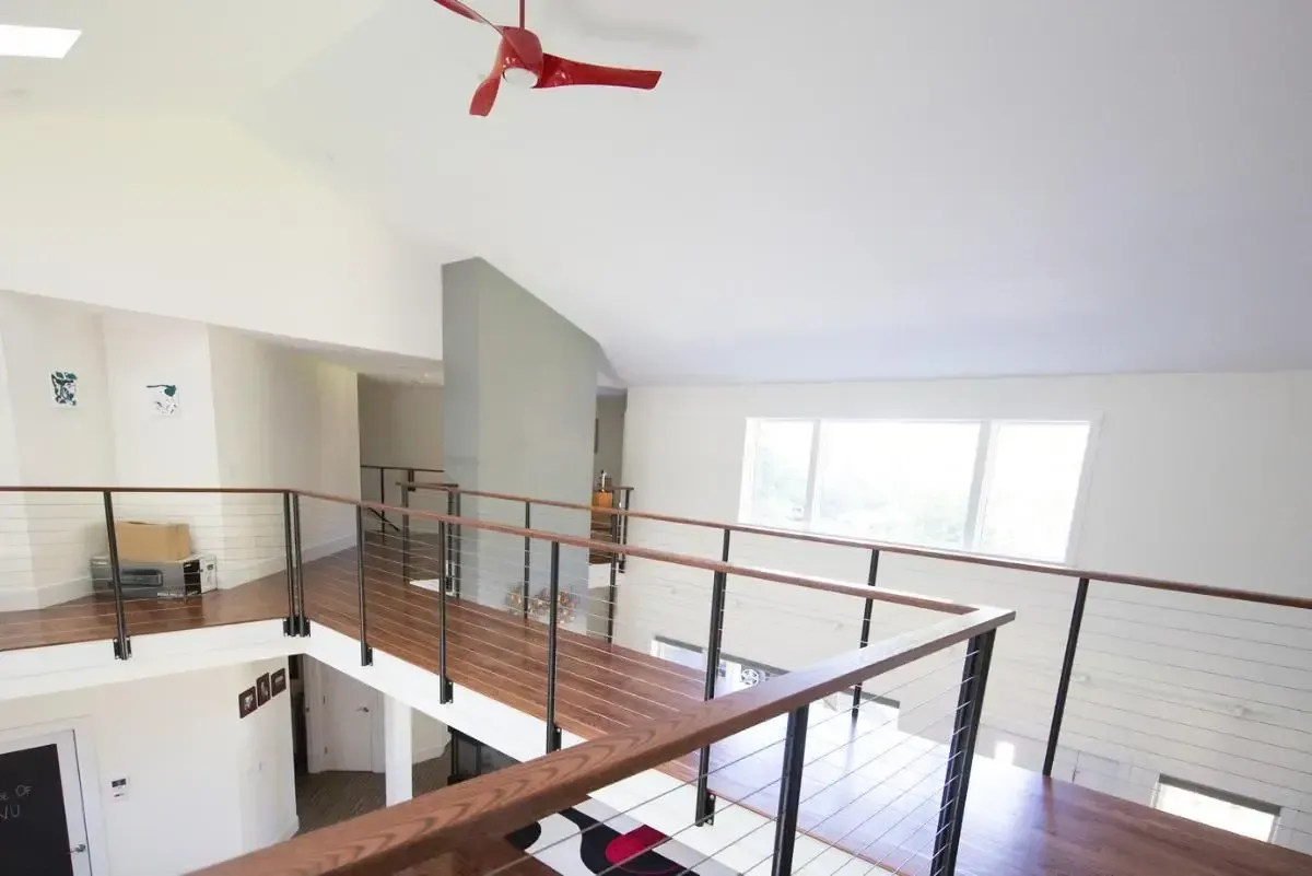 A ceiling fan is hanging from the ceiling of a house