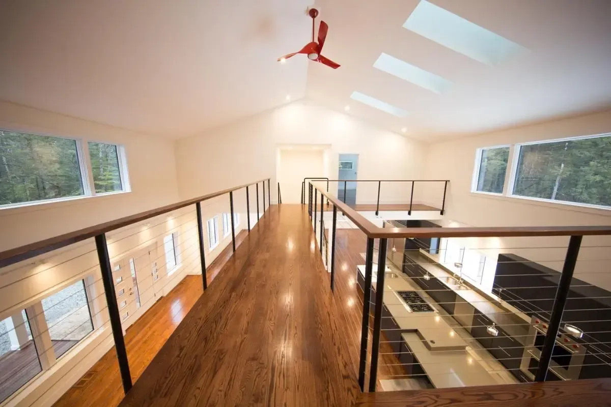 A ceiling fan is hanging from the ceiling of a house