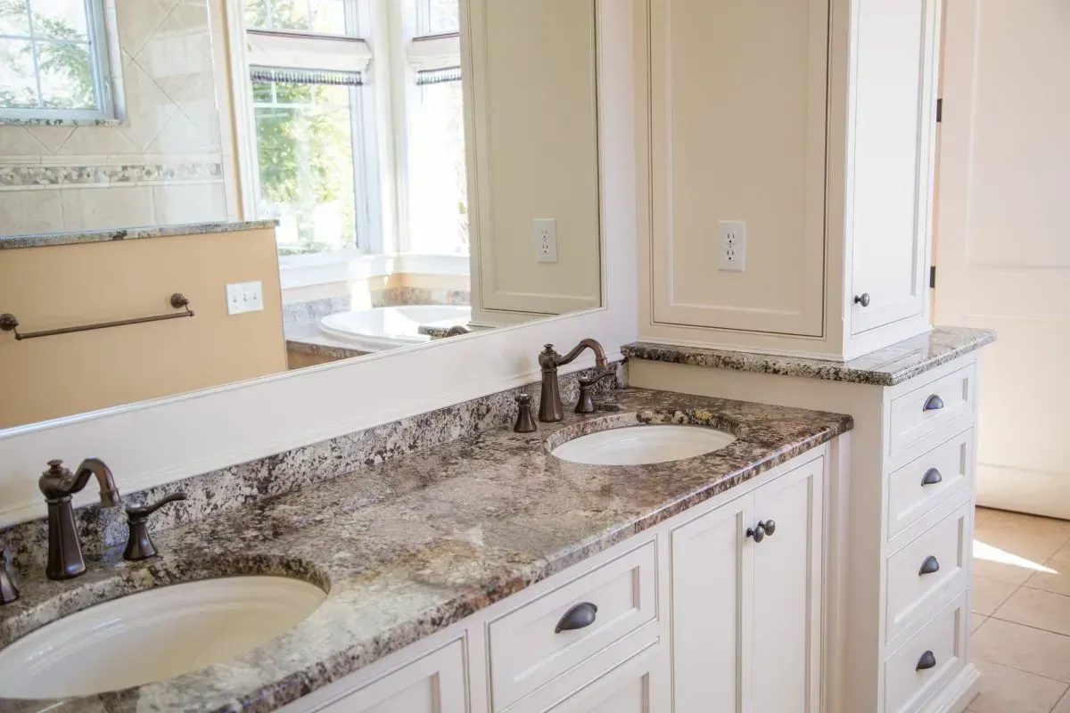 modern bathroom with granite brown marble countertops