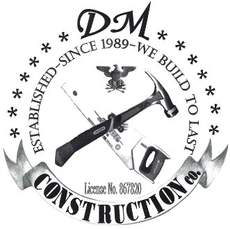 Construction company logo with crossed hammer and saw, eagle symbol, and text "DM Construction Co."