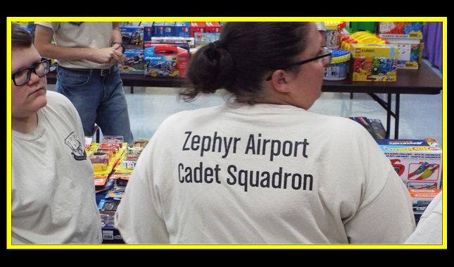 A woman wearing a shirt that says zephyr airport cadet squadron