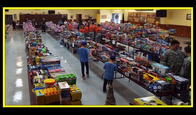 A large room filled with lots of toys and people