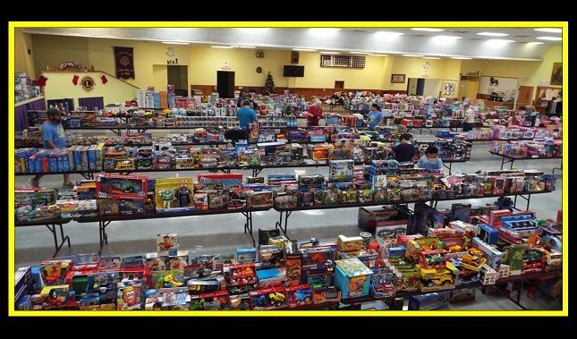 A large room filled with lots of toys on tables