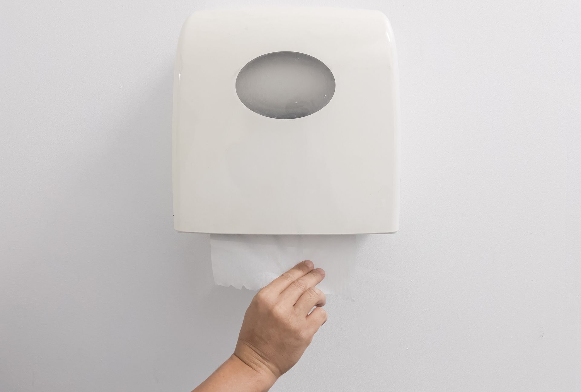 A large roll of paper is sitting on a pallet