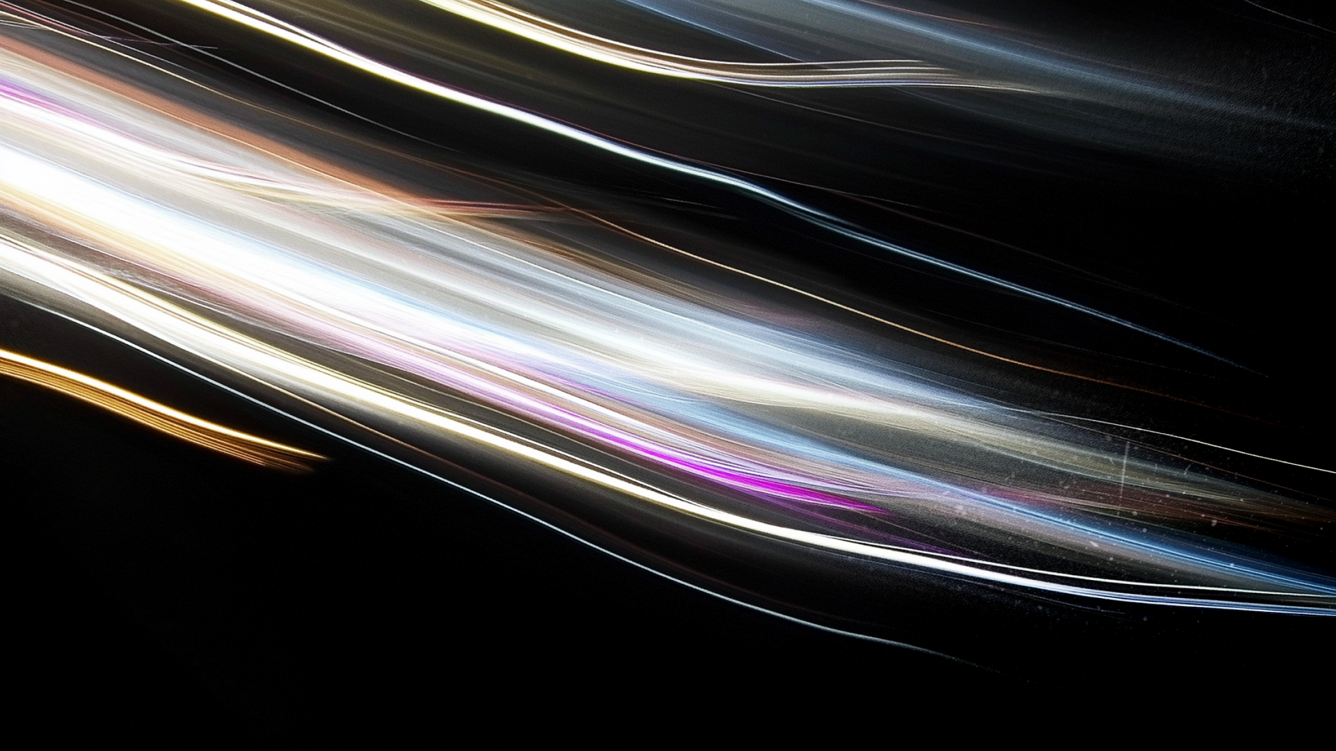 Abstract streaks of light against a black background. Varying colors: white, gold, purple, and blue.