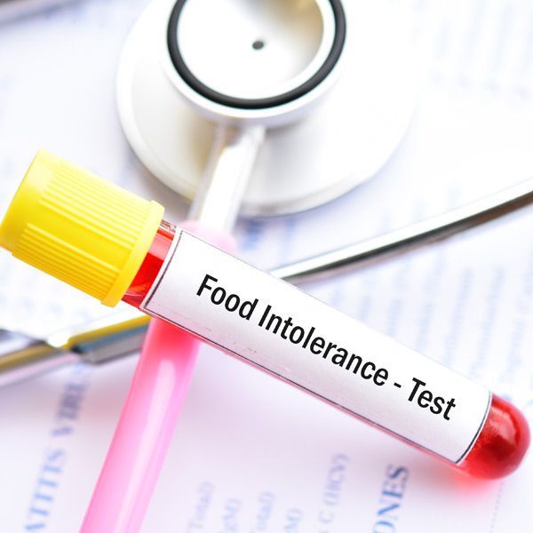 A test tube with the word food intolerance on it. Food Sensitivity