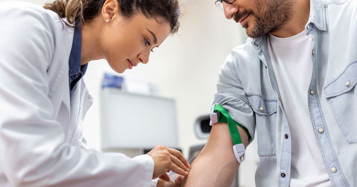 Nurse drawing blood from a patient, for Medical Tests NYC by Dr. John Salerno