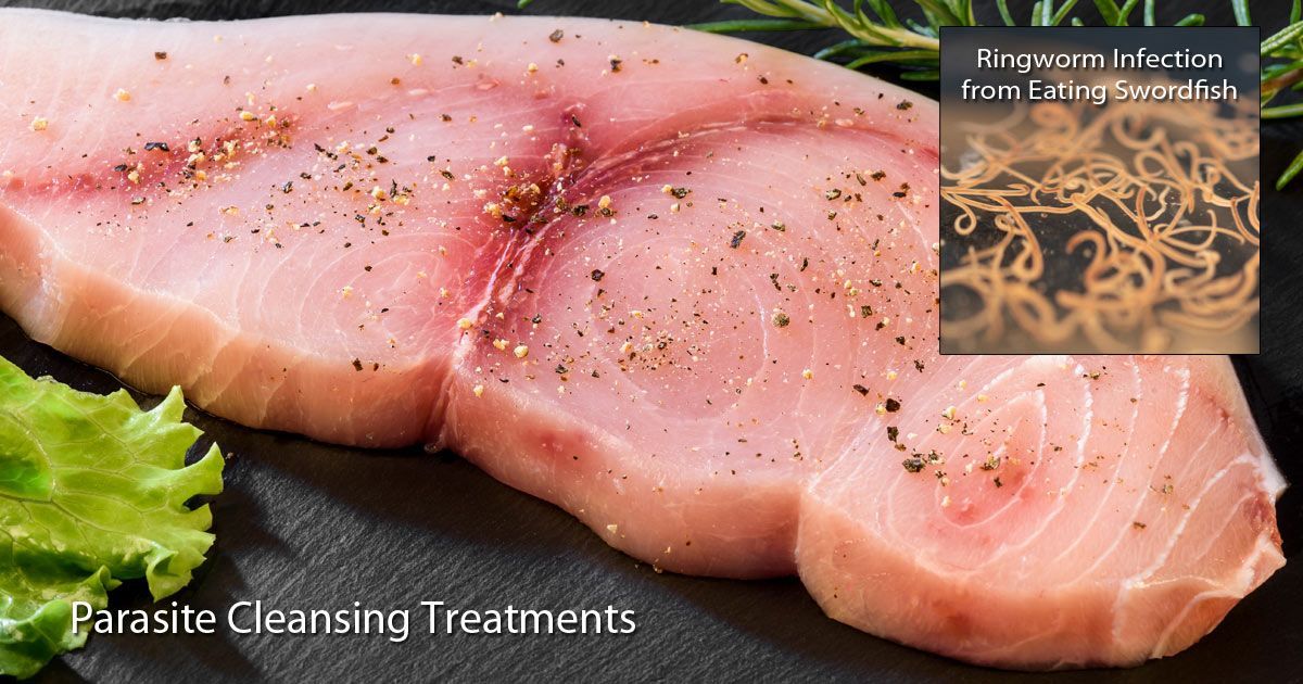 A close-up of a piece of swordfish with the words parasite cleansing treatments on the bottom representing Parasite Treatments NYC by Dr. John Salerno