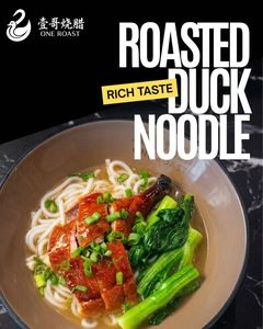 Roasted duck noodle bowl with greens and chopsticks, branded “Rich Taste” on a black background