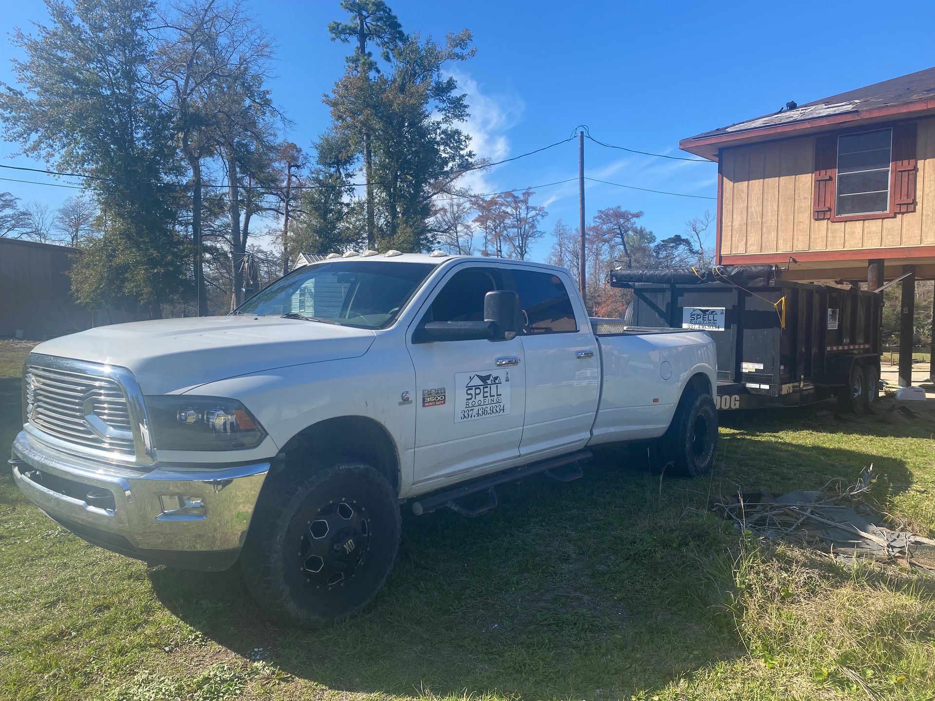 Company truck in front of house