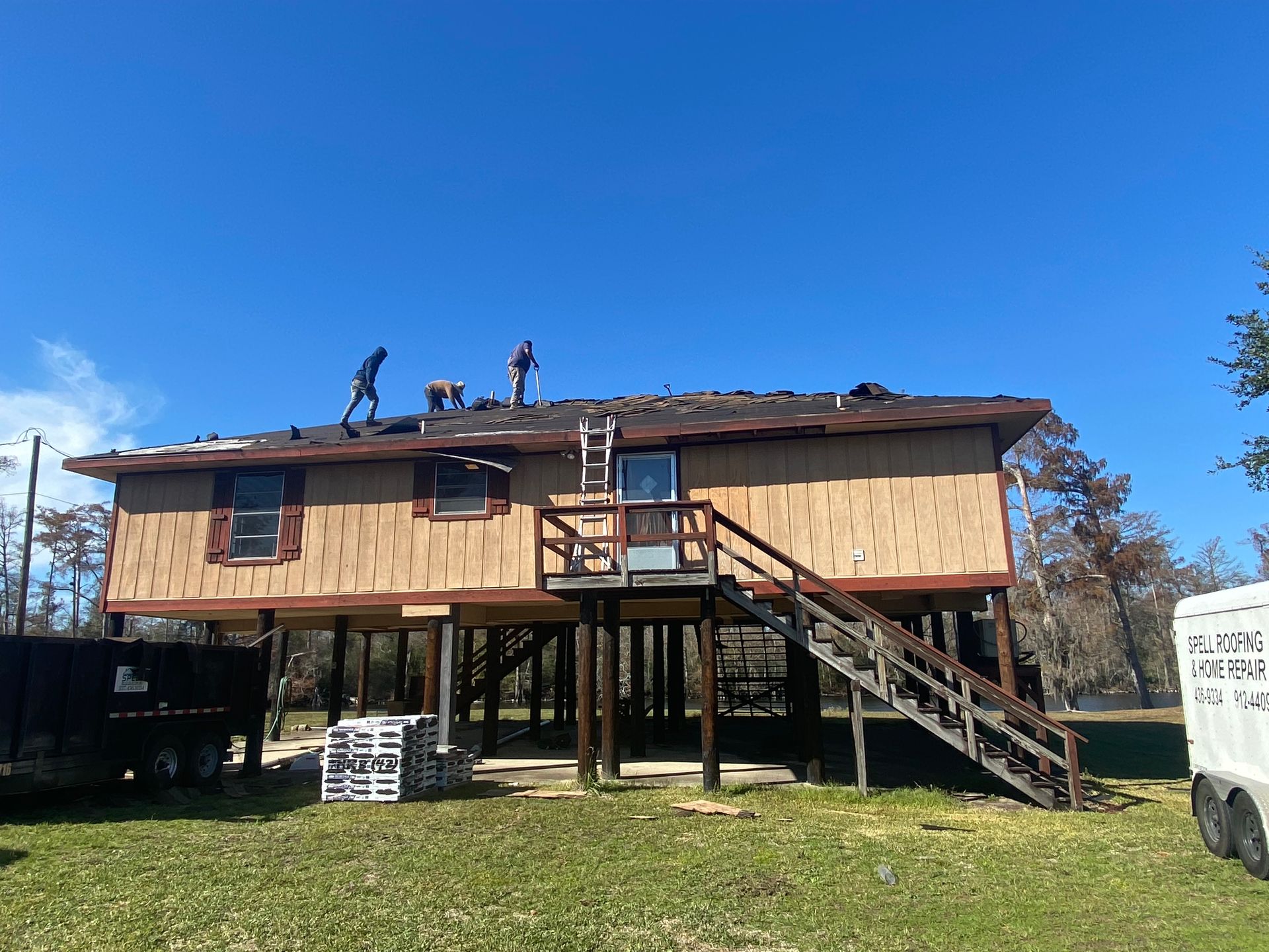 Workers on Roof of house