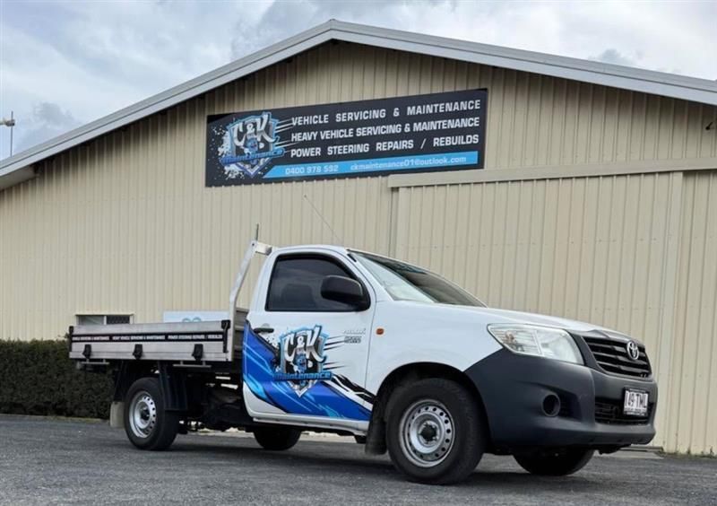 Signed Vehicle Outside Workshop — C & K Maintenance In Kawana, QLD