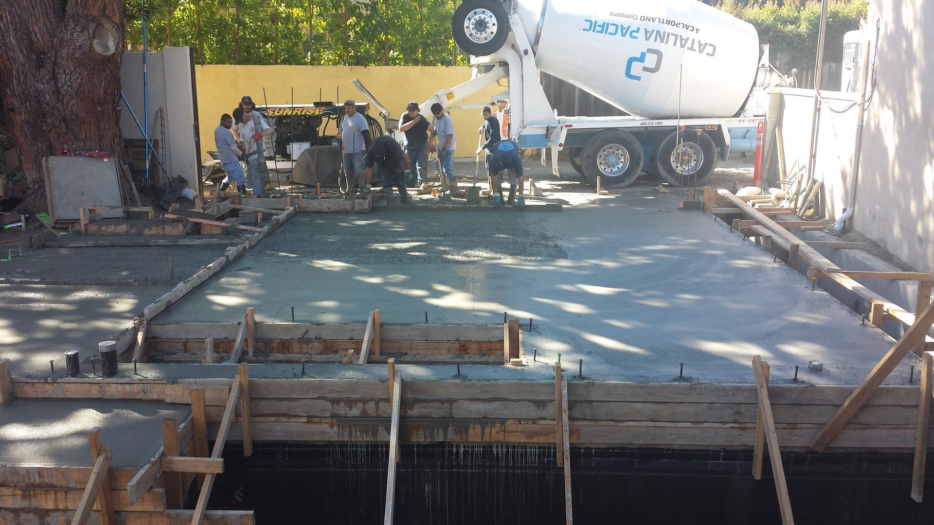 Workers Pouring Cement — Los Angeles, CA — RCW Construction Inc.