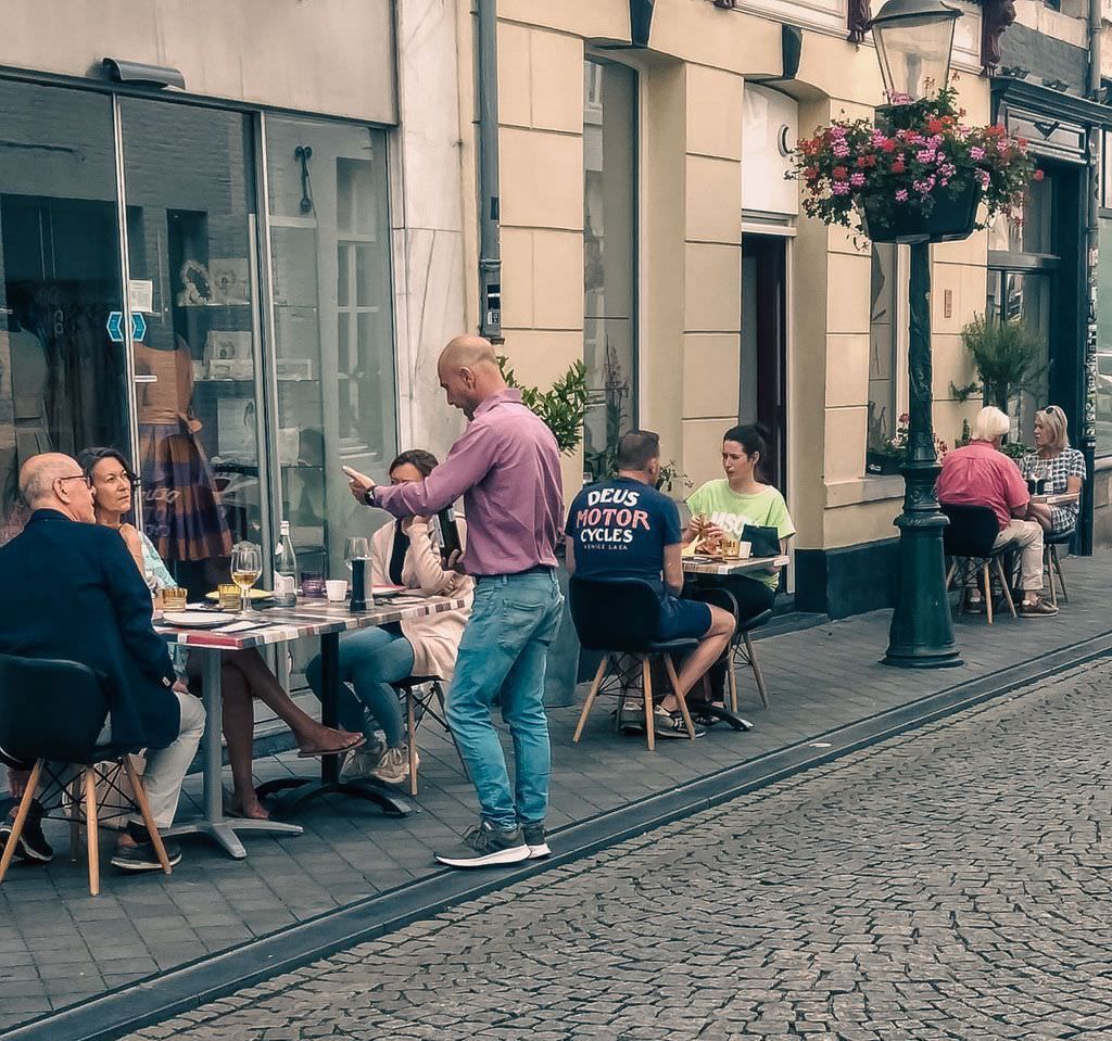 Marco taking an order on the terrace