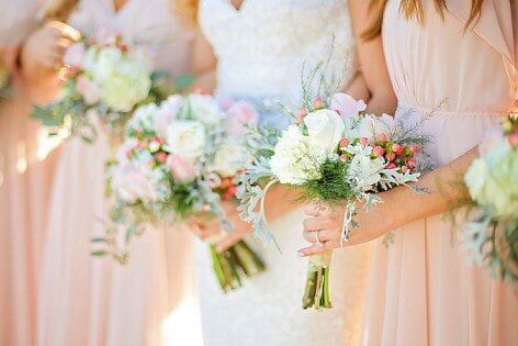 Florist — Bride Holding Bouquet Of Flower Together With Her Bridesmaids in Ridgeland, MS