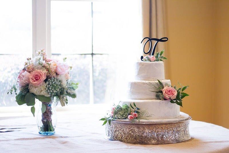 Local Florist — A Wedding Cake With Bouquet Of Flowers in Ridgeland, MS