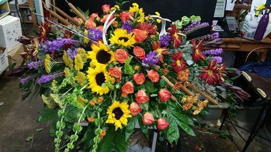 Funeral Arrangement — Colorful Flower Arrangement For Funeral in Ridgeland, MS
