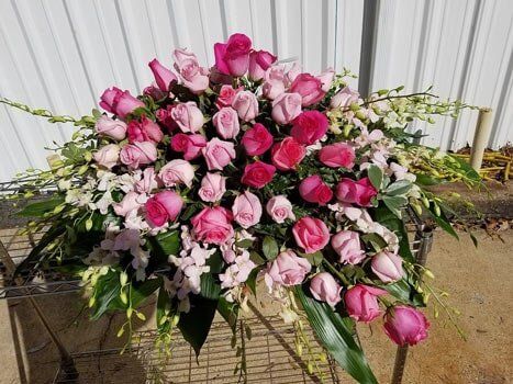 Local Florist — Pink Roses Arrangement For Funeral in Ridgeland, MS