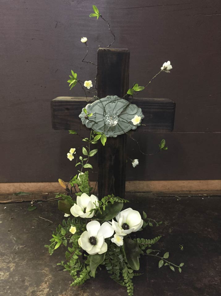 Funeral Arrangement — Cross Decorated With Flowers in Ridgeland, MS