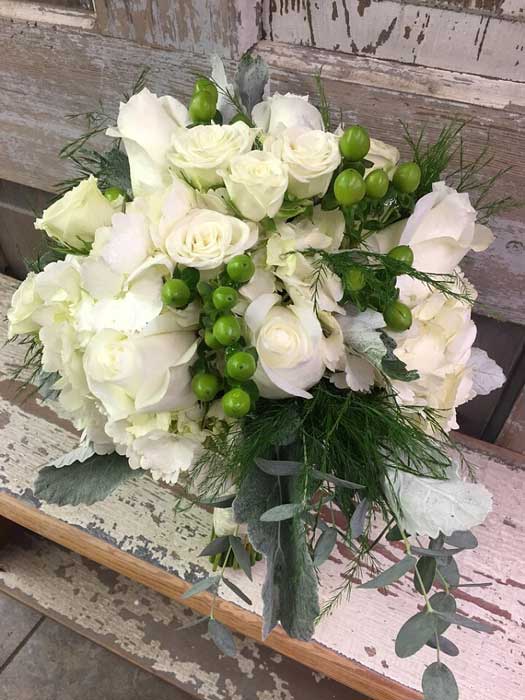 Wedding Arrangements — A White Rose Bouquet in Ridgeland, MS