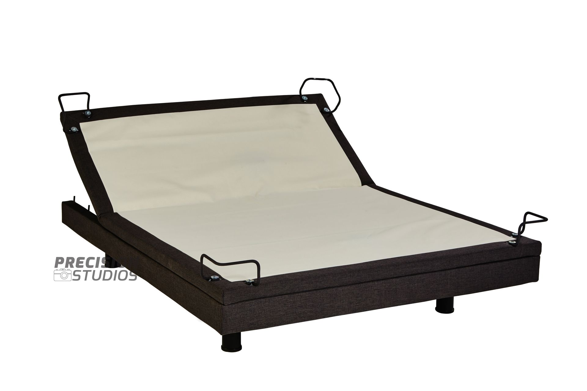 An adjustable bed frame with a white mattress on a white background