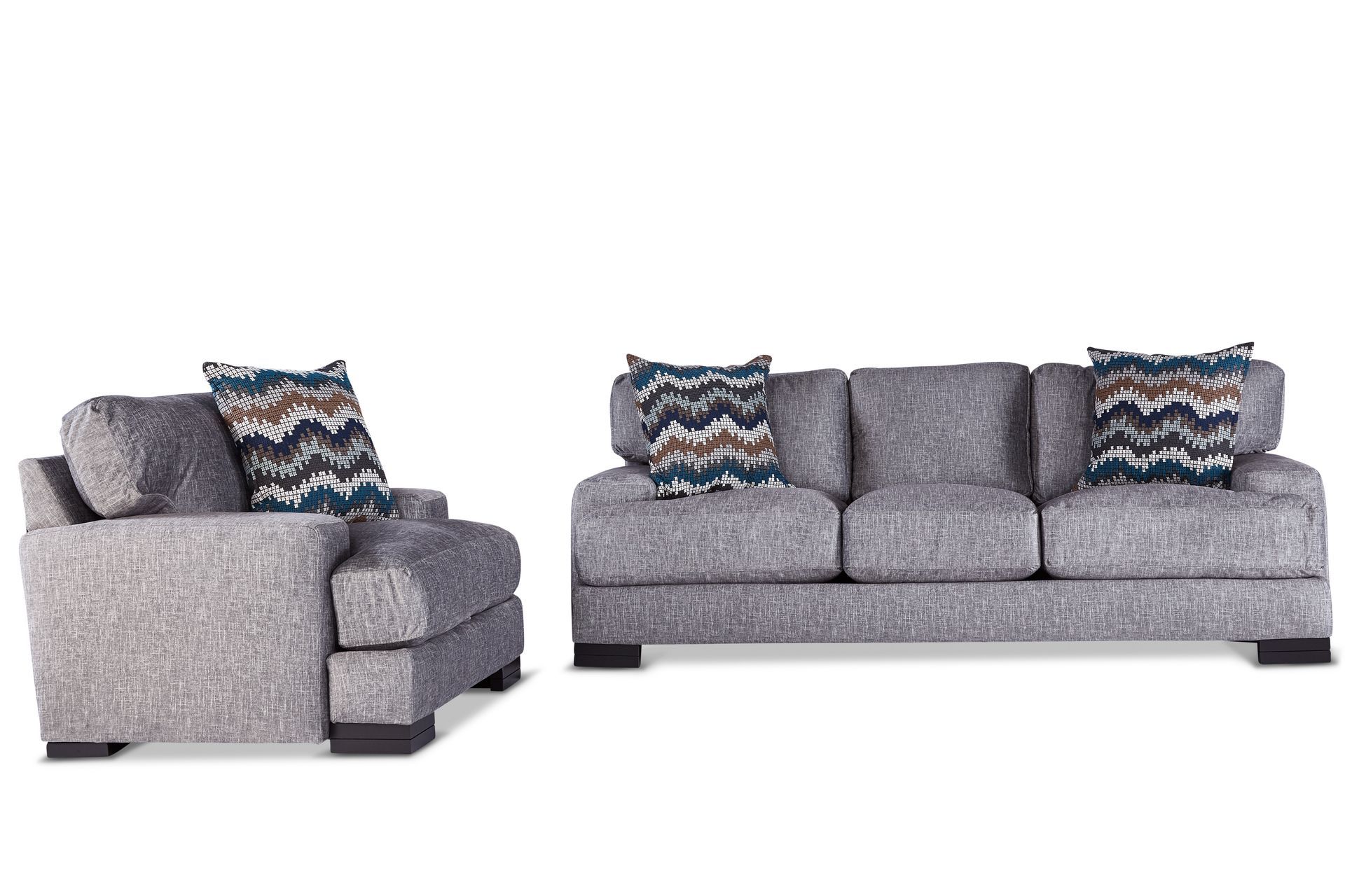 A living room set with a couch , chair , and ottoman on a white background.