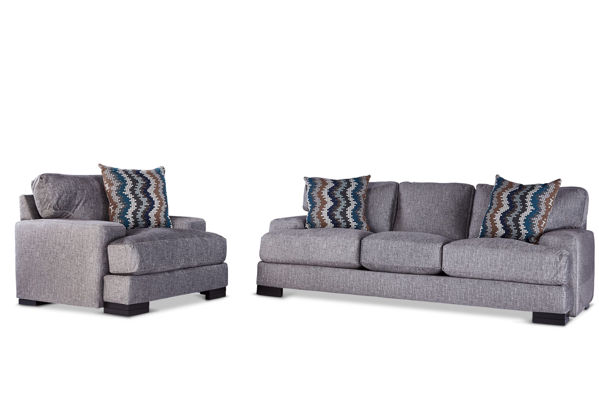 A living room set with a couch and chair on a white background.