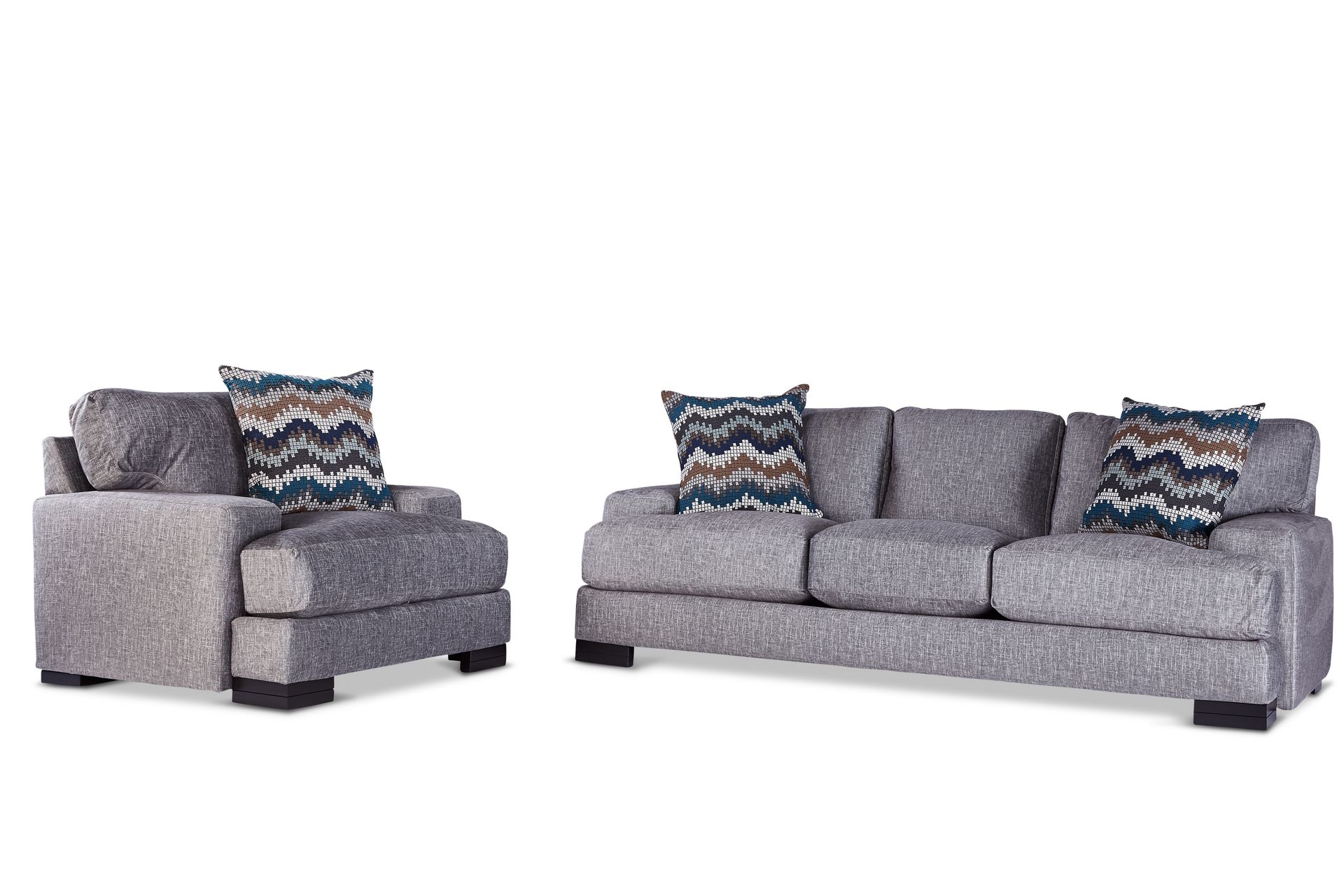 A living room set with a couch , chair and pillows on a white background.