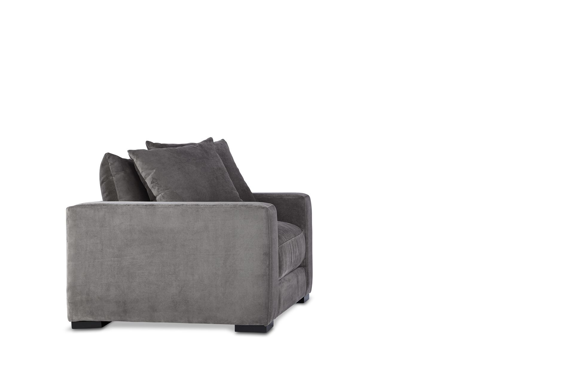 A grey couch with two pillows on a white background.