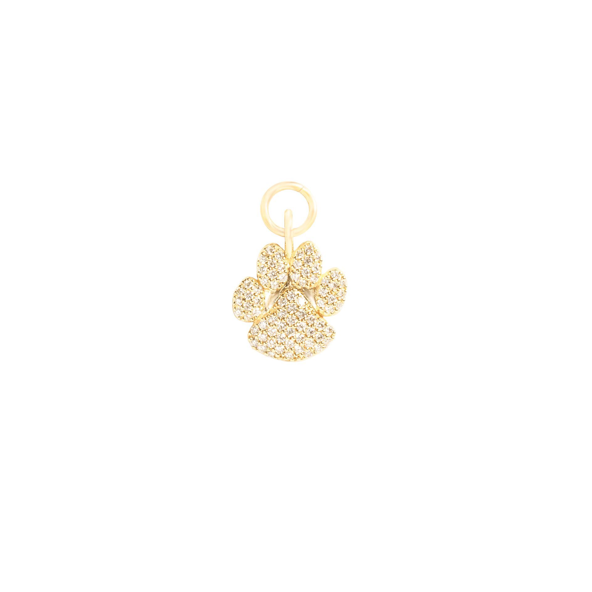 A gold pendant in the shape of a paw print with rhinestones on a white background.