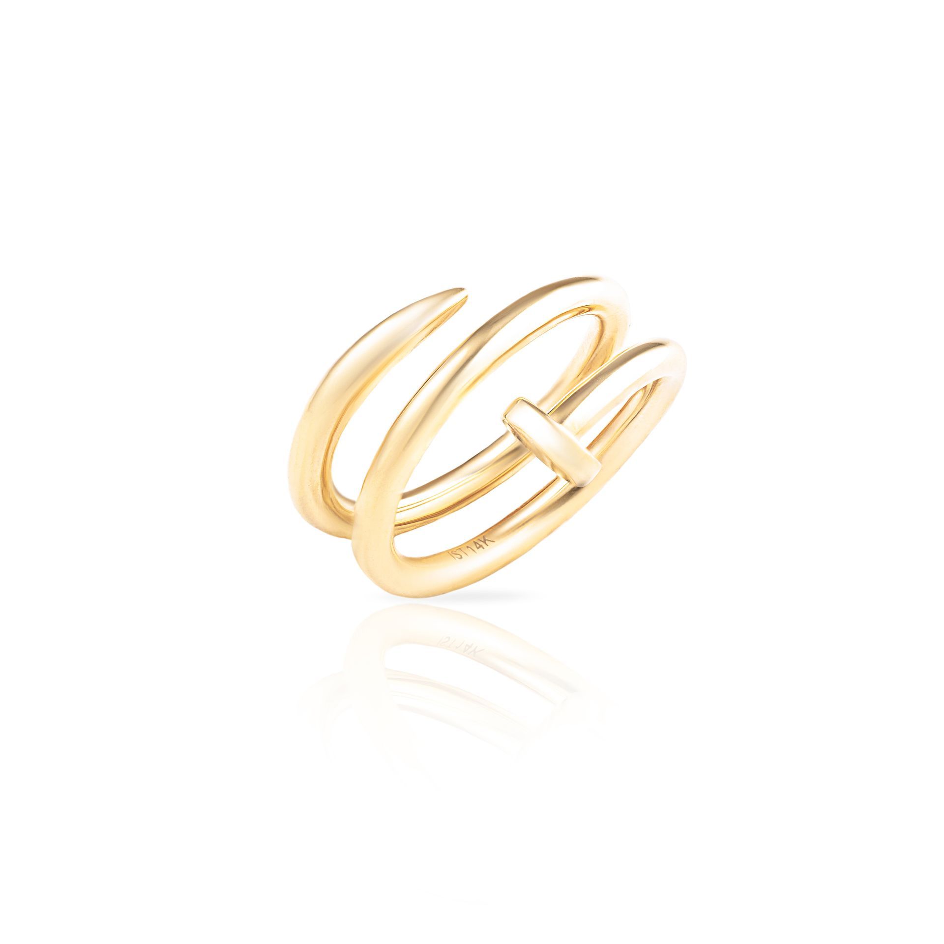 A close up of a gold ring on a white background