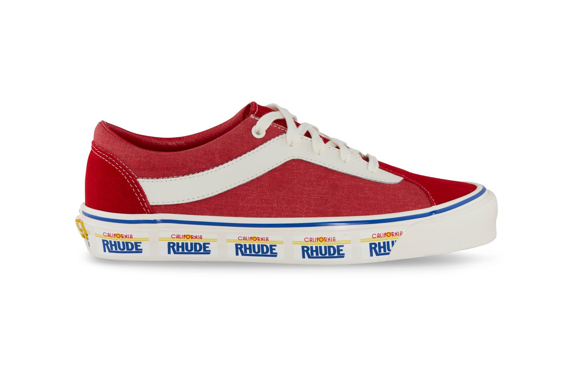 A pair of red and white vans shoes on a white background.