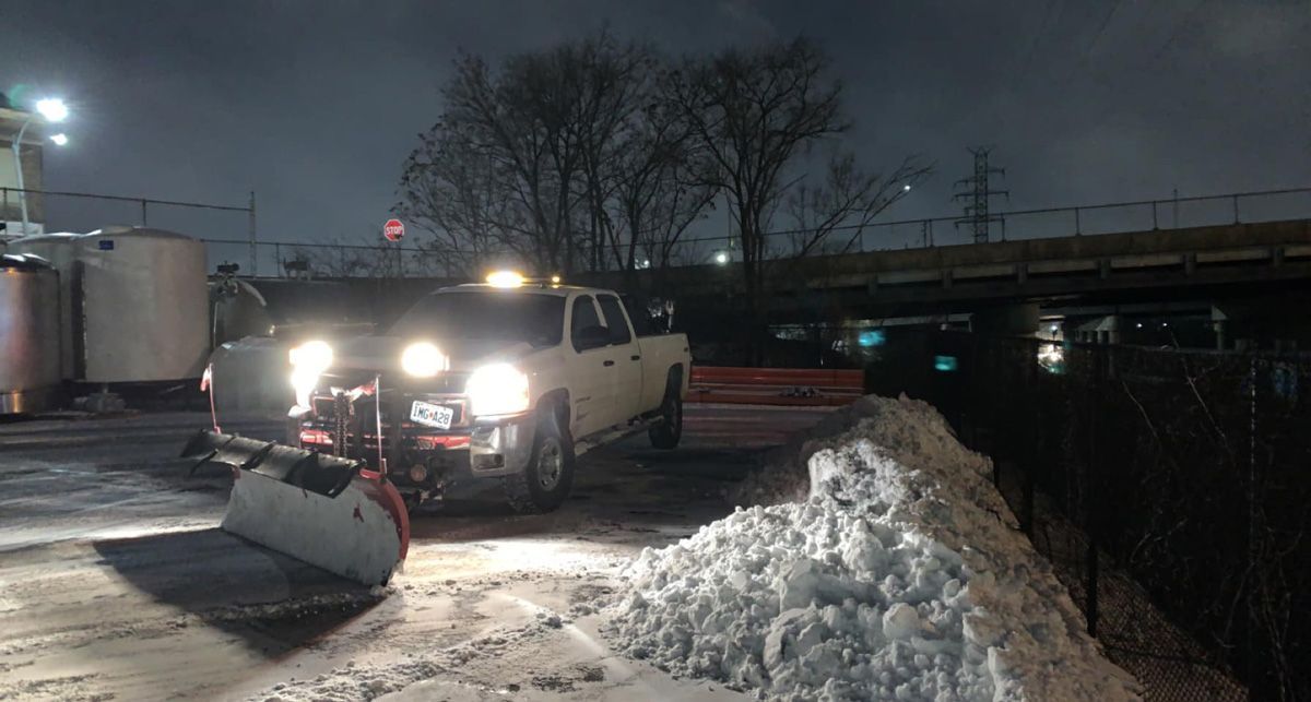 Truck Plowing Snow in a Parking Lot — Saint Louis, MO — Zerr Lawn Care & Landscape LLC